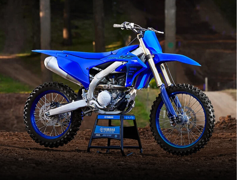 2021 Yamaha YZ450F motorcycle parked in Harrison, New York, showcasing its sleek design and vibrant colors.